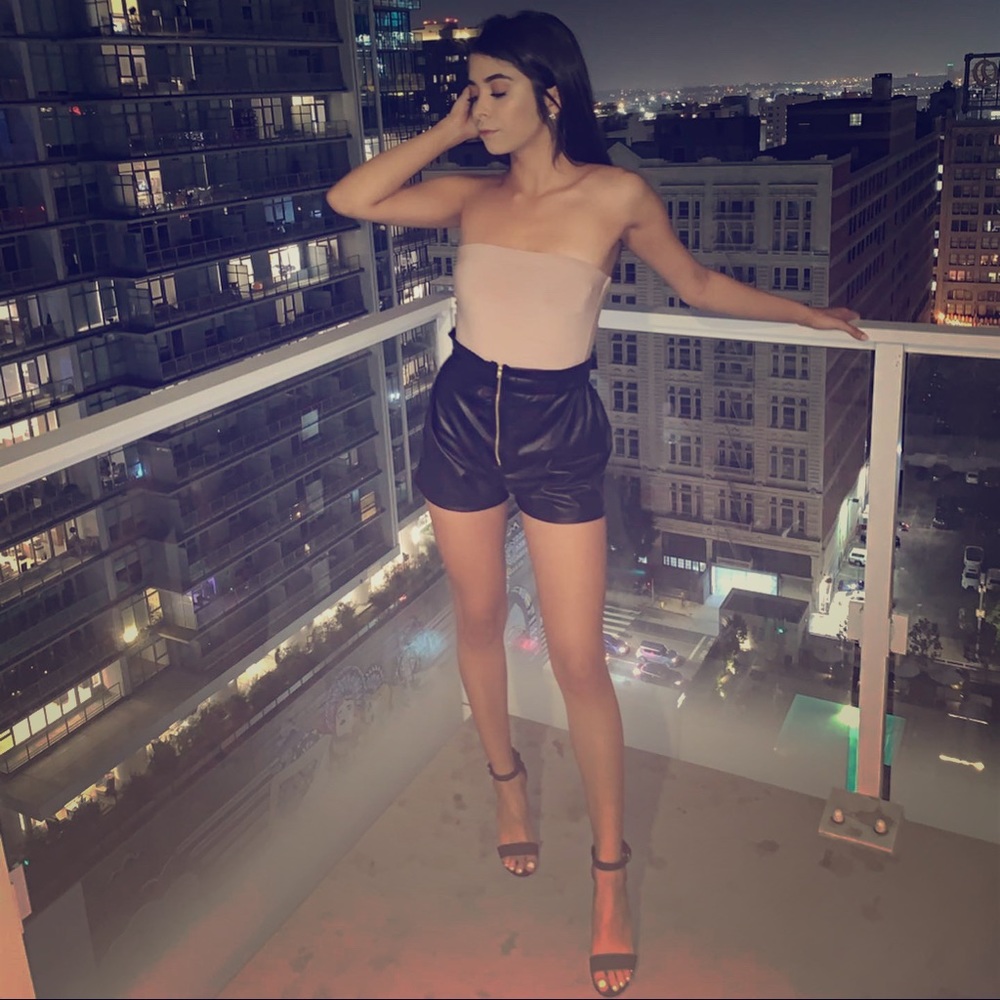 High waisted black shorts (trash bag material)